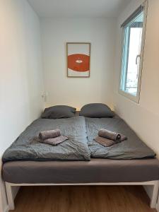 Postel nebo postele na pokoji v ubytování Ostseeblick