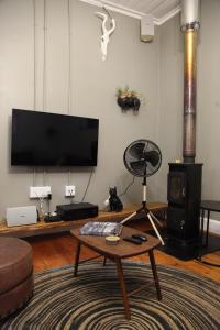 TV a/nebo společenská místnost v ubytování Light Shade Mountain + 18 fotografií