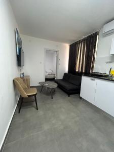 Kuchyň nebo kuchyňský kout v ubytování Slomo Place