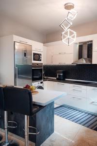 Køkken eller tekøkken på Luxury Suite Prada