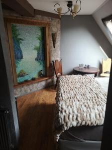 Ένα ή περισσότερα κρεβάτια σε δωμάτιο στο Noorse Viking kamer en suite