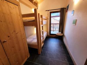 Ένα ή περισσότερα κρεβάτια σε δωμάτιο στο Résidence Le Criterium - Résidence Le Critérium 3Chalet E Appartement 8 MAE-1903