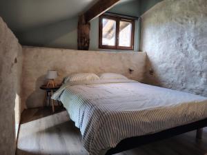 Ένα ή περισσότερα κρεβάτια σε δωμάτιο στο Le Goire at Le Maingaud