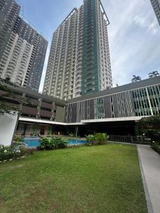 a large building with two tall buildings at Marexe in Tabok