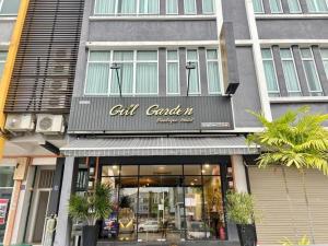 a store with a sign on the front of a building at Collection O Malacca Near St John's Fort Formerly Gill Garden in Melaka