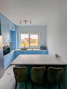 Kuchyň nebo kuchyňský kout v ubytování Eden home Sibiu