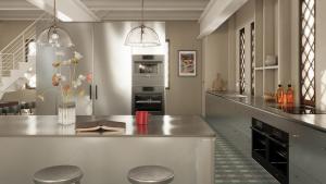 a kitchen with a counter with two stools in it at Finest Retreats - ARC Thorpeness in Thorpeness