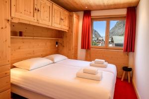 Postel nebo postele na pokoji v ubytování Portillo 205