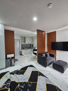 Kuchyň nebo kuchyňský kout v ubytování JPR Apartment