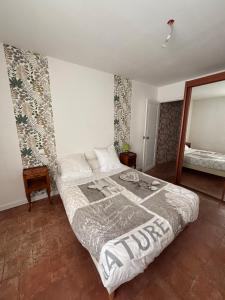 Postel nebo postele na pokoji v ubytování maison Odjas