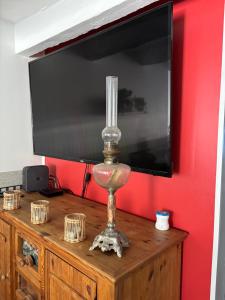 TV a/nebo společenská místnost v ubytování maison Odjas