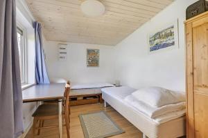 Una cama o camas en una habitación de 30140-Malling-Askvaenget-5 27 fotos más
