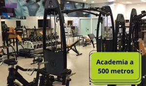 a gym with a sign that says acadiana at Apartamento no Centro da Cidade in Parauapebas