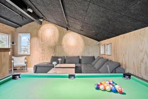 a living room with a pool table at 40106-Juelsminde-Fasanlunden-34 in Juelsminde