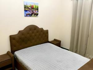 Ένα ή περισσότερα κρεβάτια σε δωμάτιο στο Babe House - For Females only