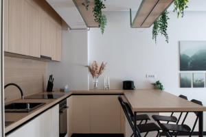 Kuchyň nebo kuchyňský kout v ubytování The Lake Home B1, Ap 29 + 1 fotografie