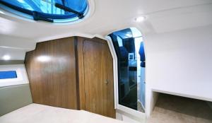 a room with a door and a window in a boat at Siesta Luxury Love Boat - NOCLEG NA ŁODZI W MARINIE SOLNEJ in Kołobrzeg +28 photos