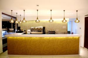 A kitchen or kitchenette at Hotel A44