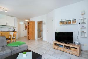 TV a/nebo společenská místnost v ubytování Grachtenstube