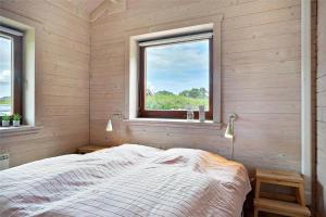 Ένα ή περισσότερα κρεβάτια σε δωμάτιο στο 40506-Juelsminde-Pot-Strandby-314 +30 φωτογραφίες