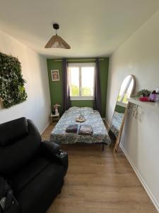 Postel nebo postele na pokoji v ubytování Le Cosy familiale & pro 8 pers