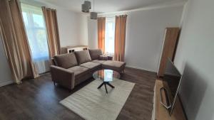 Χώρος καθιστικού στο Zagan Apartments #1