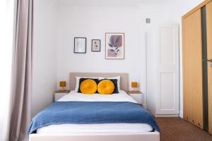 En eller flere senge i et værelse på Central Avenue by Arrenda