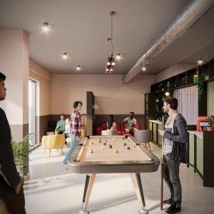 a group of people in a room with a pool table at Destiny Student - Burnet Point in Edinburgh