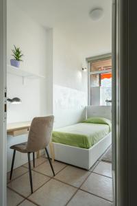 Postel nebo postele na pokoji v ubytování Maison Carla