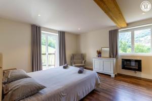 Ένα ή περισσότερα κρεβάτια σε δωμάτιο στο La sentinelle