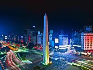 a lit up obelisk in a city at night at Tango BA 2 in Buenos Aires
