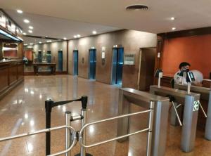 a person taking a picture of a hallway in a building at Tango BA 2 in Buenos Aires