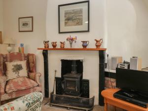 Et tv og/eller underholdning på The Laundrymaid's Cottage