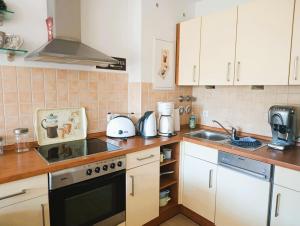 Nhà bếp/bếp nhỏ tại Residenz Strandkrone 15 +6 ảnh