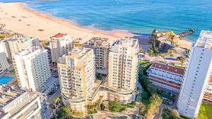 an aerial view of a beach and buildings at Surf Spot by Moje Holiday in Portimão