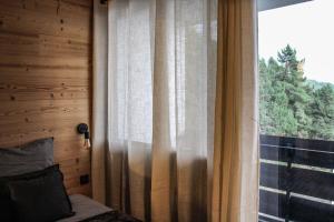 Postel nebo postele na pokoji v ubytování Le lodge étoilé + 6 fotografií