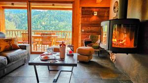 Posezení v ubytování Chalet les Brevins