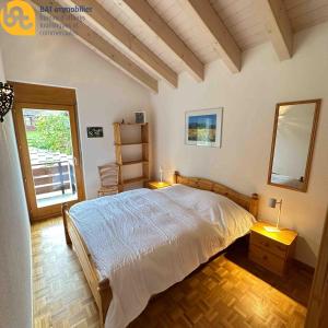 Postel nebo postele na pokoji v ubytování Scierie E Moiry 222, attique lumineux proche des télécabines