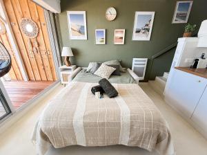 Ένα ή περισσότερα κρεβάτια σε δωμάτιο στο Cosy Up - Arcachon - Duplex vue mer