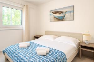 Postel nebo postele na pokoji v ubytování Villa Greif + 67 fotografií