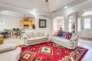 a living room with two couches and a red rug at 8 Mi to Lake Palestine Peaceful Family Retreat in Flint