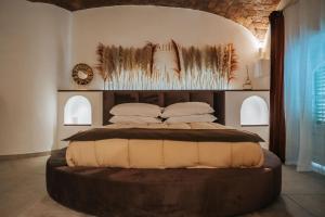 Ένα ή περισσότερα κρεβάτια σε δωμάτιο στο Zahira suite&spa +22 φωτογραφίες