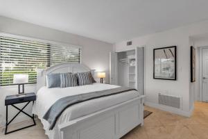 Ένα ή περισσότερα κρεβάτια σε δωμάτιο στο Oasis on the Green