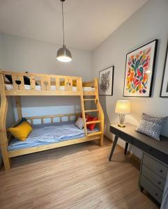 Ένα ή περισσότερα κρεβάτια σε δωμάτιο στο The Clover Homestay 1