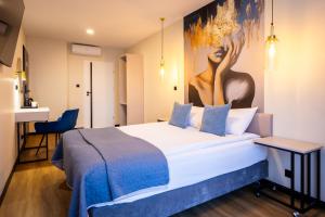 En eller flere senge i et værelse på MOTTO Gdańsk Boutique Stay Old Town - butikowe pokoje na starówce + 94 billeder