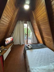 Voodi või voodid majutusasutuse Skychale toas +34 fotot