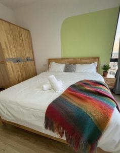 Postel nebo postele na pokoji v ubytování The Clover Homestay 2