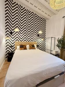 Katil atau katil-katil dalam bilik di Apartamento en Conil Centro