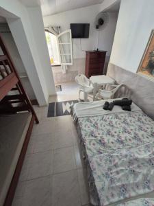 Katil atau katil-katil dalam bilik di Casa Arara suite 4