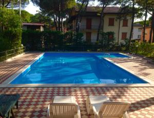 Bazén v ubytování G/Hotel Lignano nebo v jeho okolí